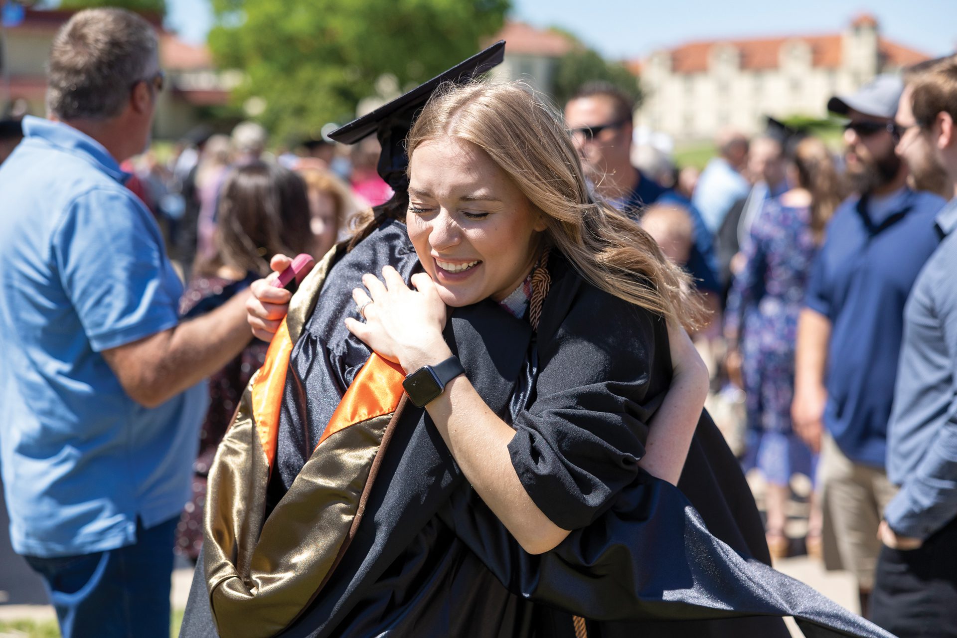 graduate alumni celebrating graduation