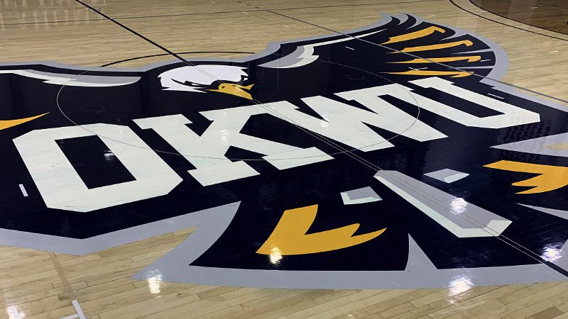 photo of OKWU eagle basketball court logo