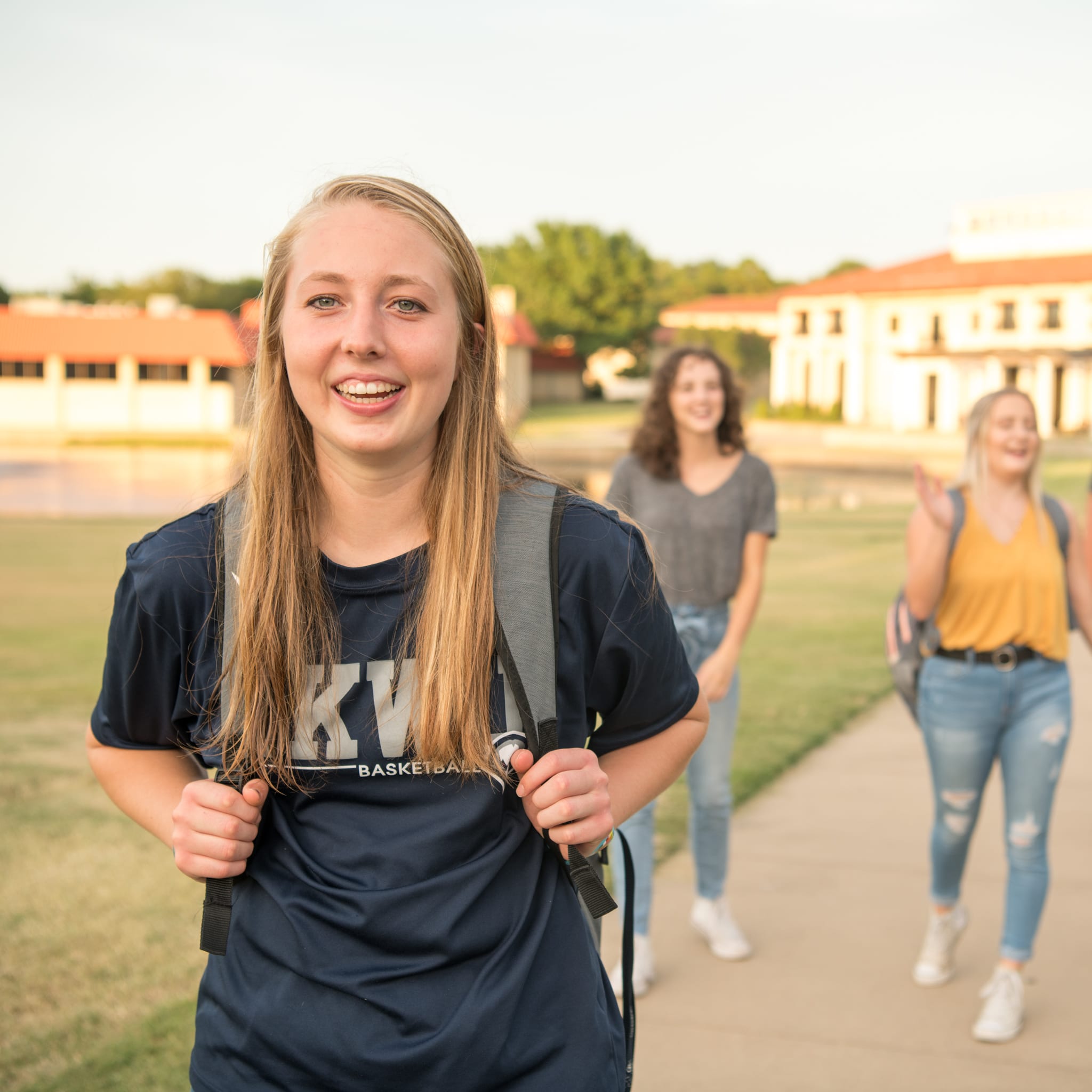 2020photoshoot-20 student standing on campus square