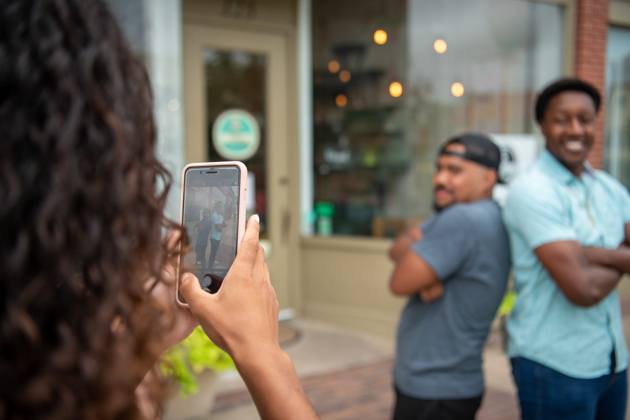2020photoshoot-26 Student taking a picture on their phone