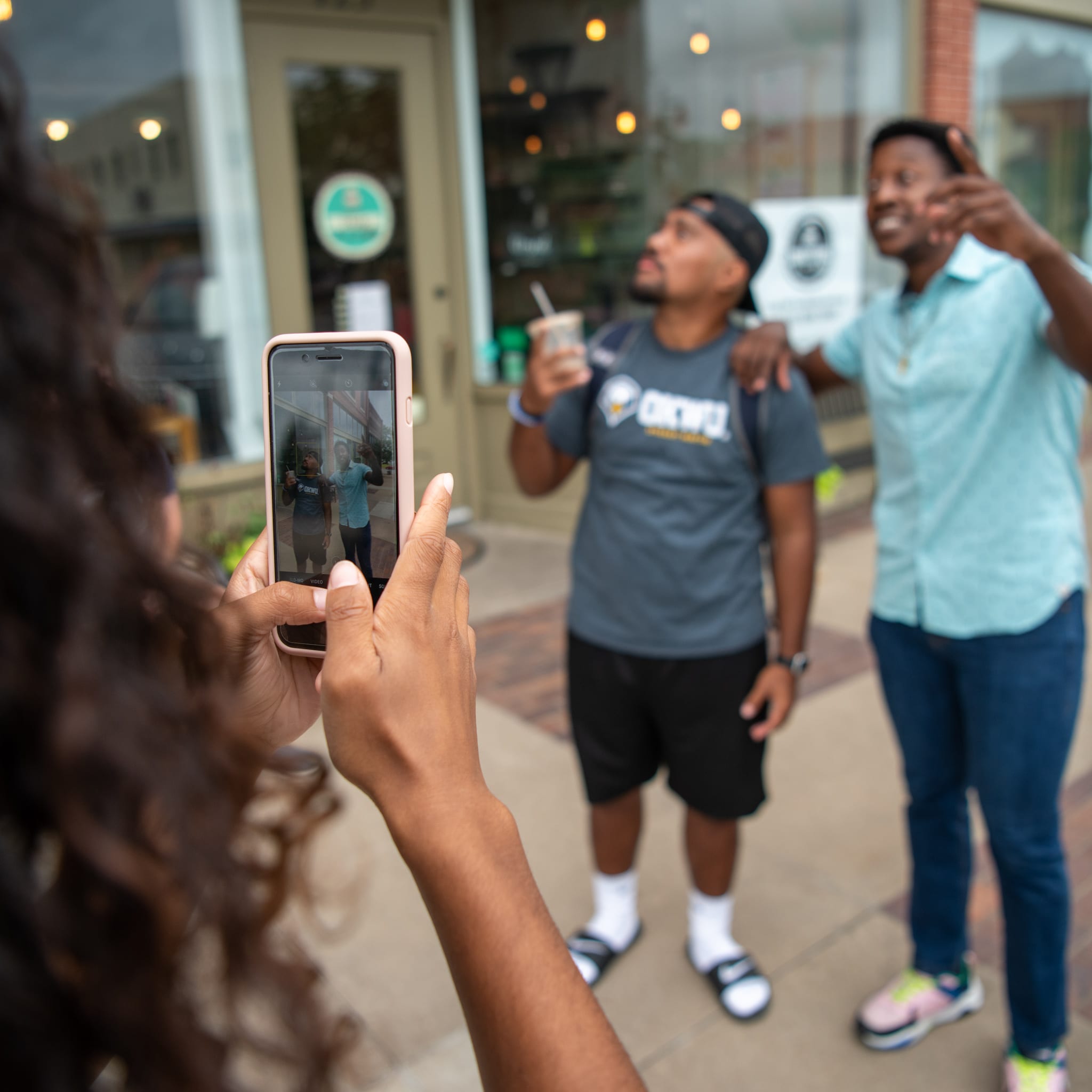 2020photoshoot-30 student taking pictures of another student square