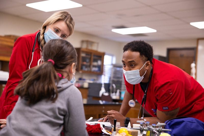 OKWU Nursing Students Two nursing students assess patient