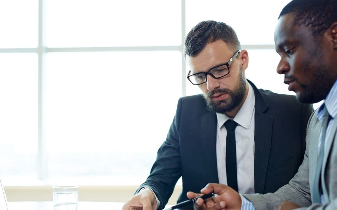 men networking in office