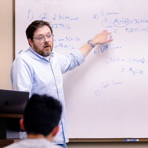 Accounting professor Jason Bussey teaching in class Accounting professor Jason Bussey teaching in class