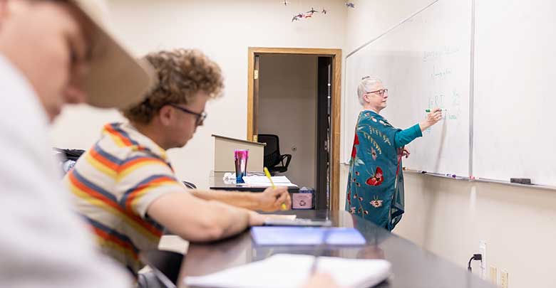 Dr. Hartter teaching in class