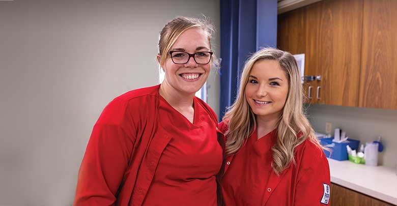 nursing student with professor