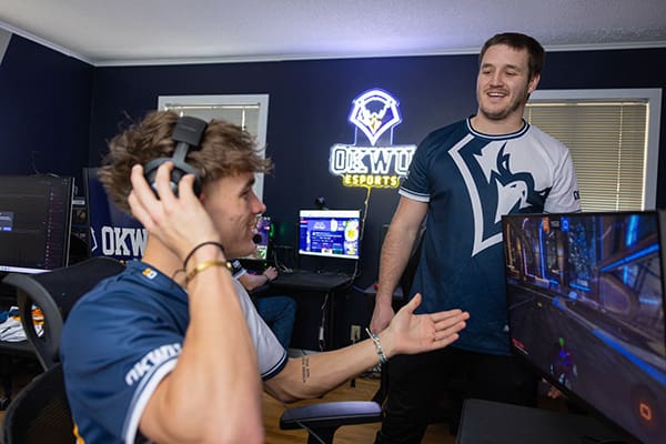 Alex Young coaching one of our E-Sports players.