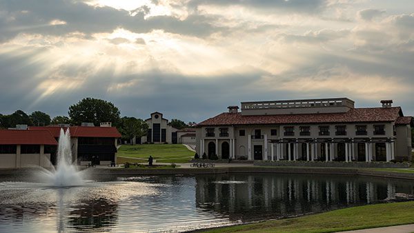 Sun rays hitting our campus looking across the pond