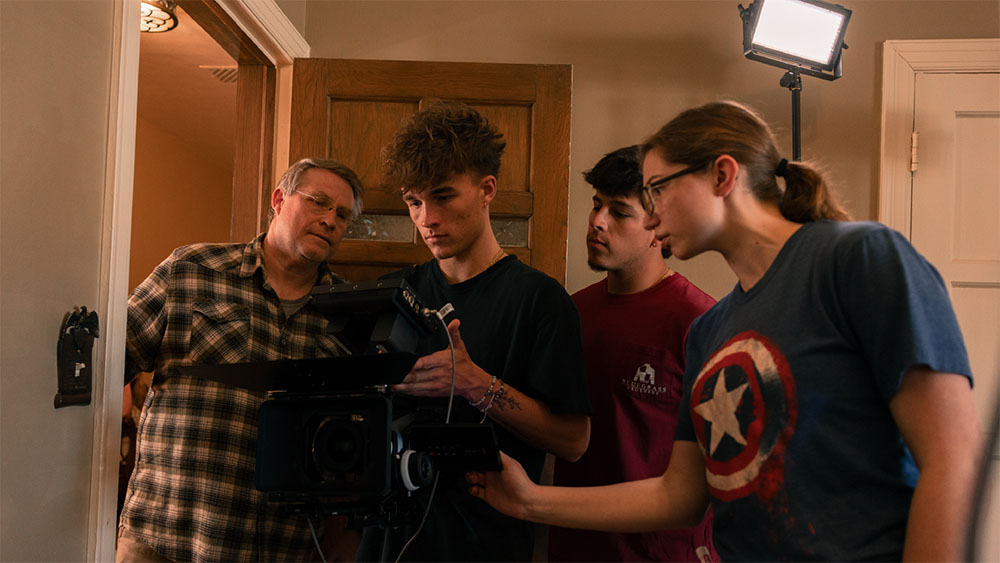 Faculty 3 OKWU Students learning film with Professor Blackert