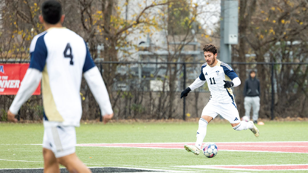 News 8 Two OKWU Soccer Athletes playing soccer.